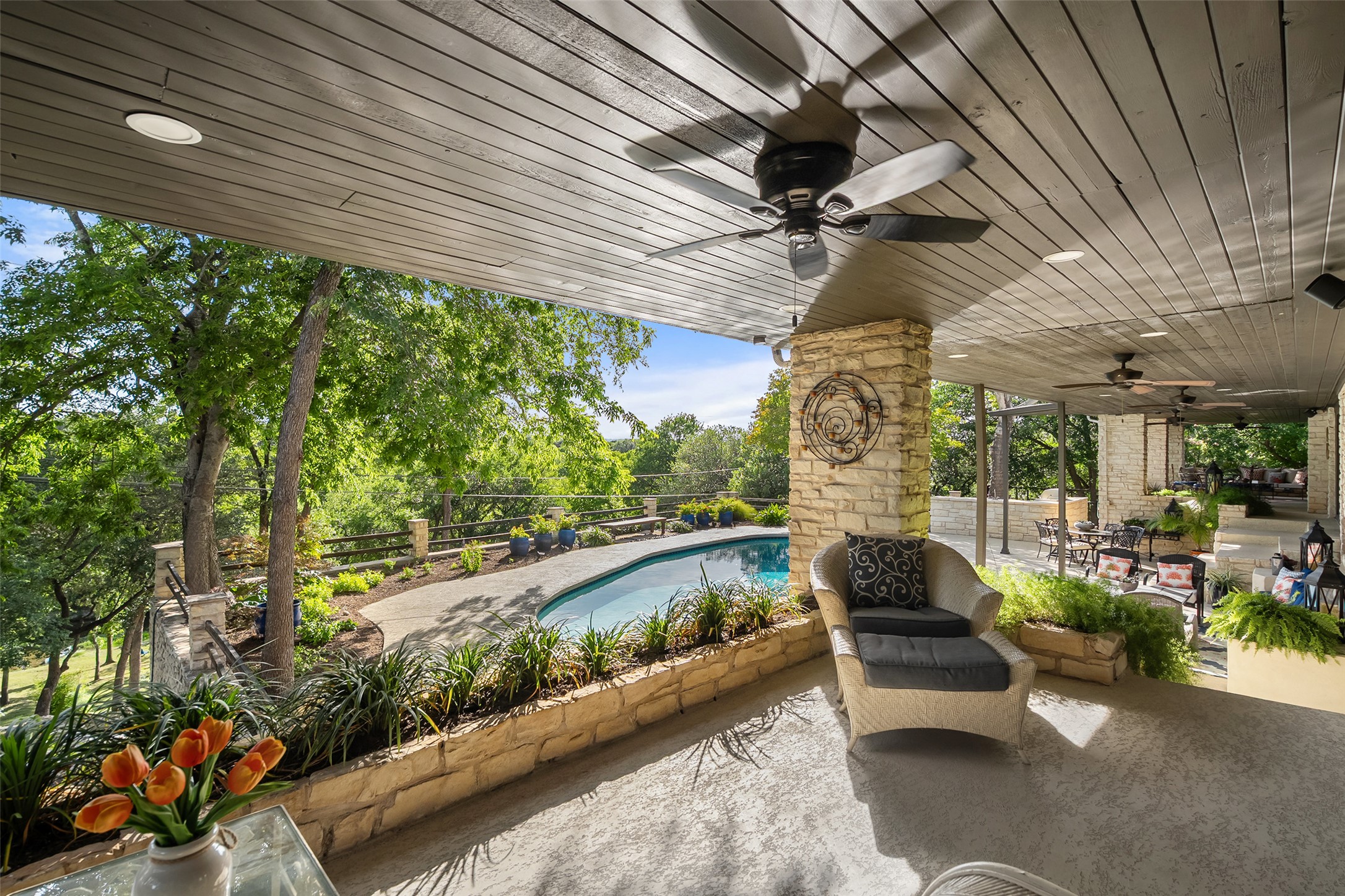 2924 Gabriel View Drive Georgetown, TX 78628 - Photo 24 of 34 a view of a patio with table and chairs and potted plants