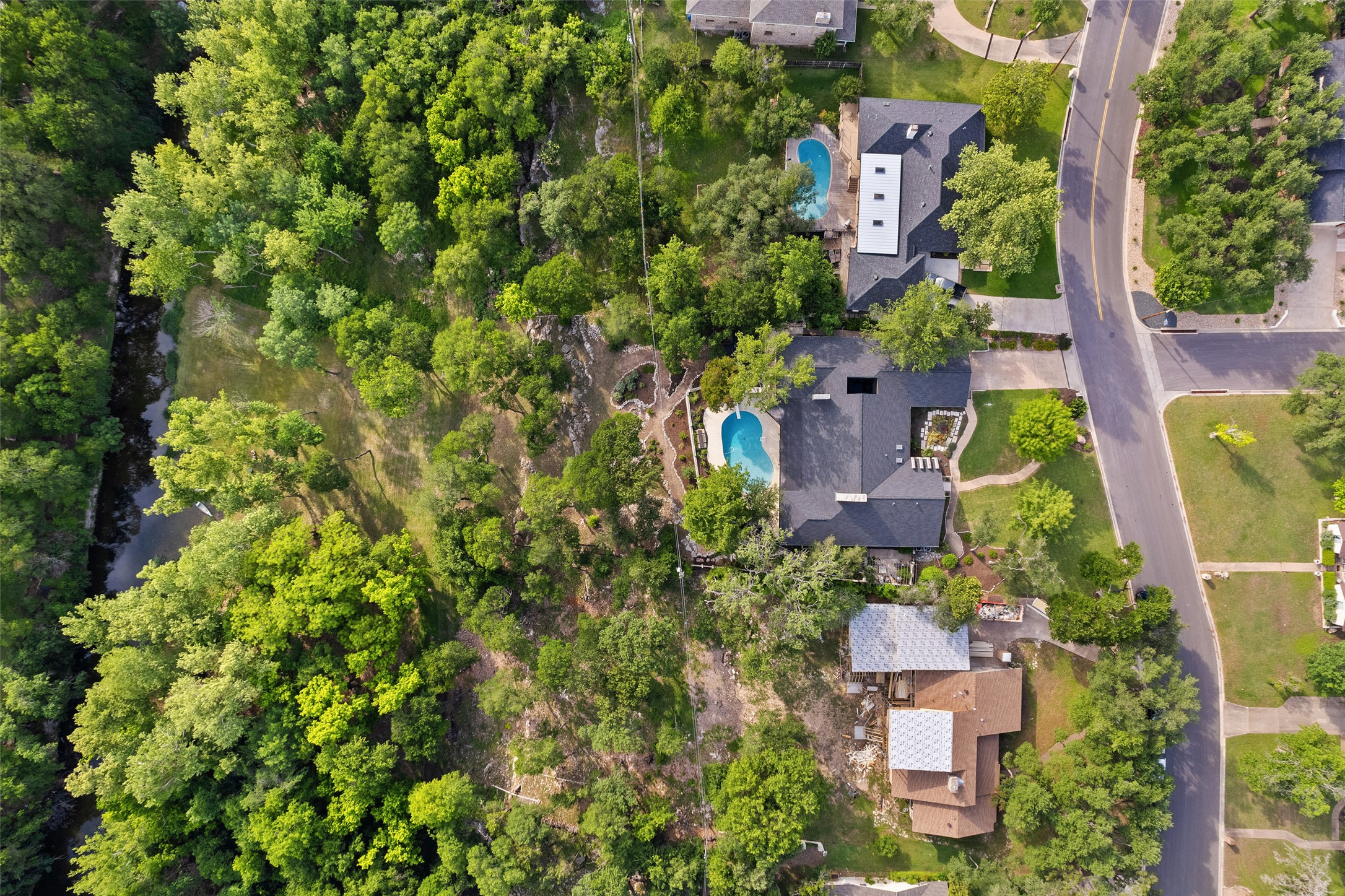 2924 Gabriel View Drive Georgetown, TX 78628 - Photo 3 of 34 an aerial view of a house with a yard and lake view
