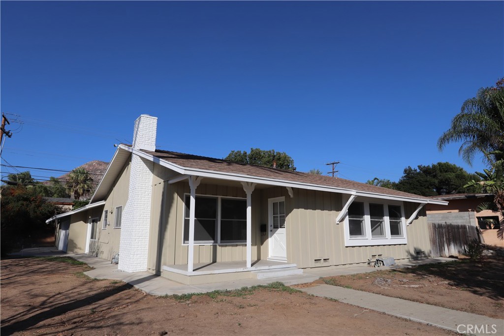 587 West Blaine Street Riverside, CA 92507 - Photo 1 of 1 a front view of a house with a garage