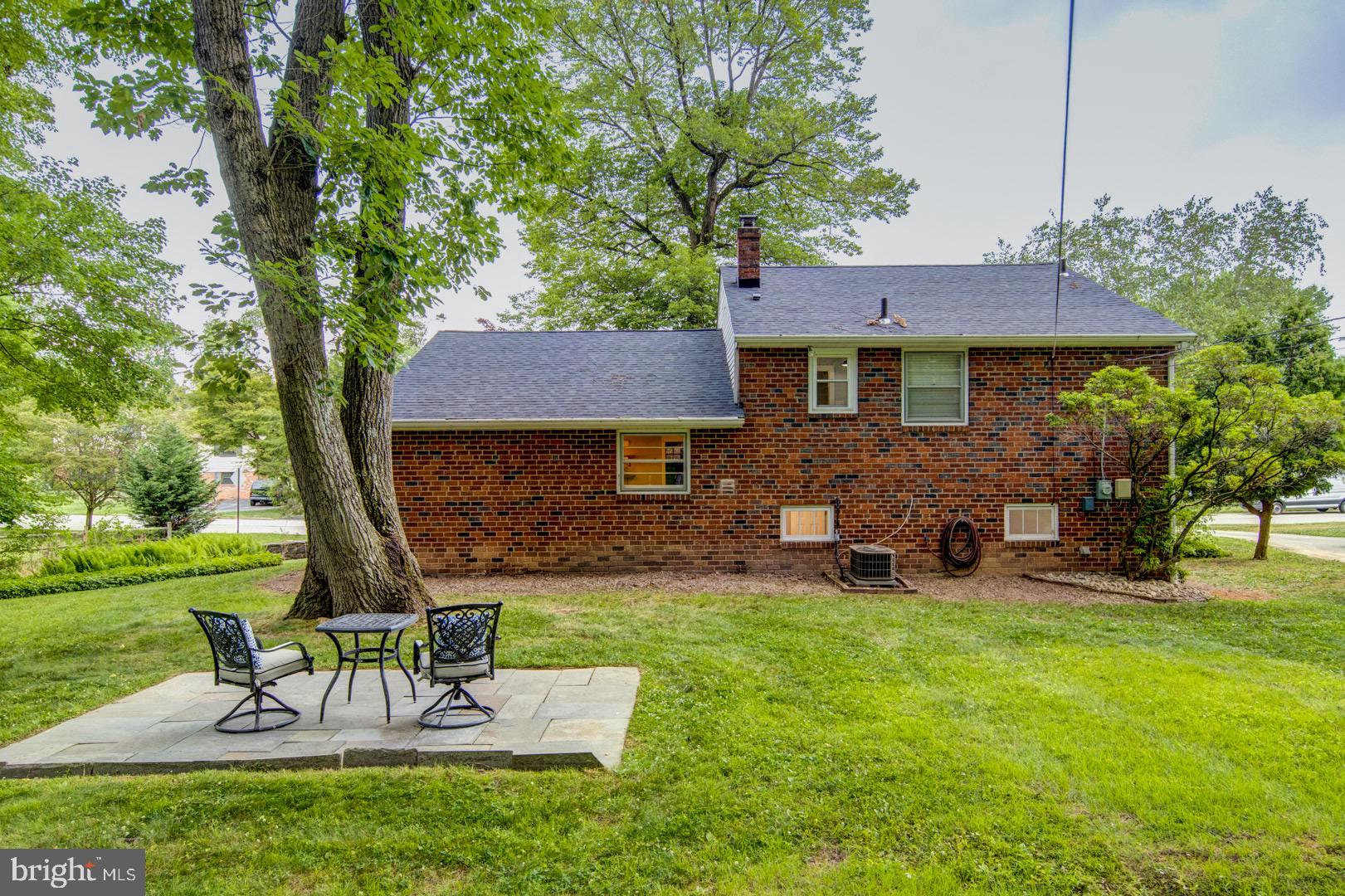 696 Mallard Road Wayne, PA 19087 - Photo 3 of 23 Exterior Rear and Flagstone Patio