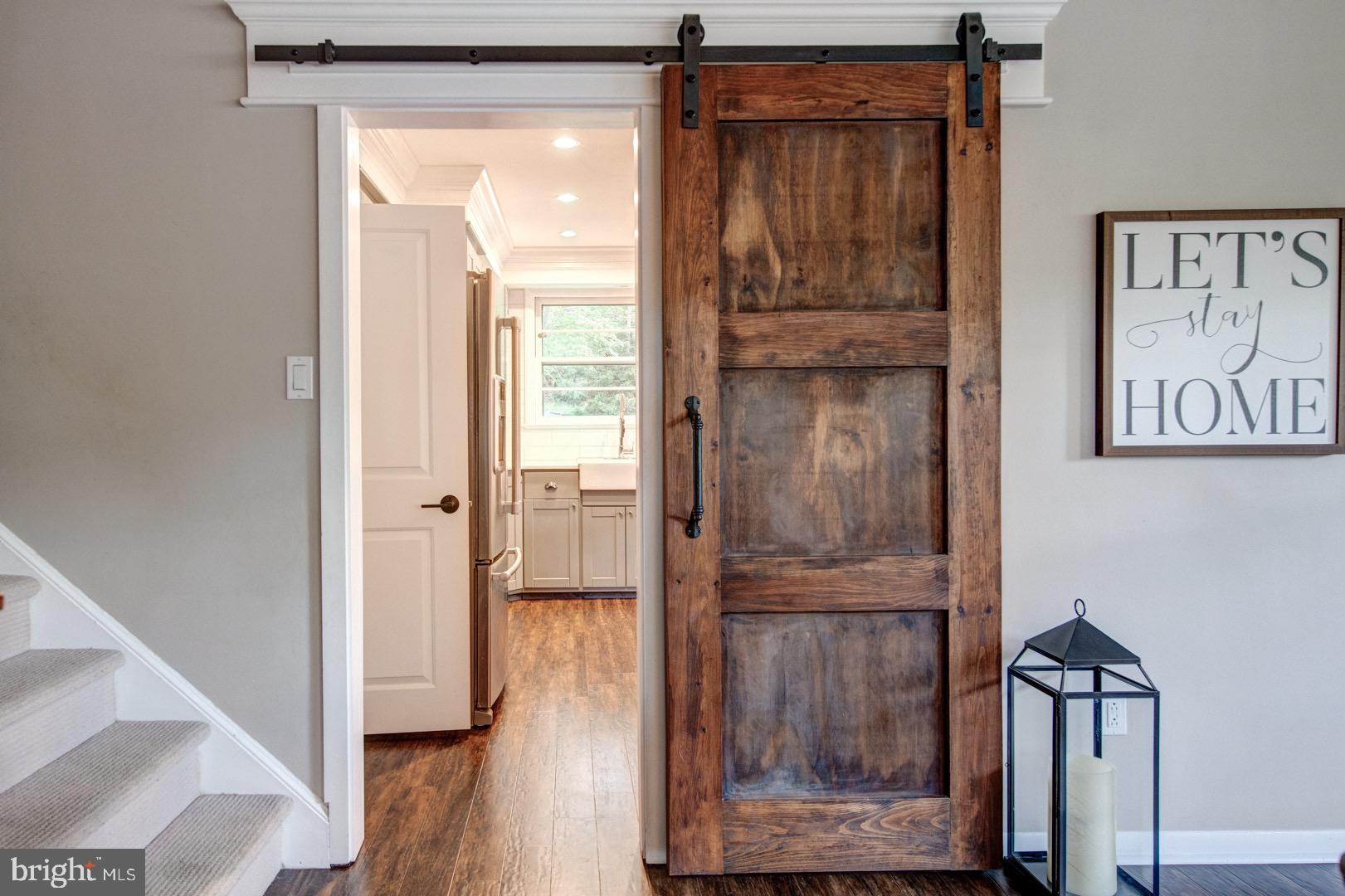 696 Mallard Road Wayne, PA 19087 - Photo 7 of 23 Barn Door between Living Room and Kitchen
