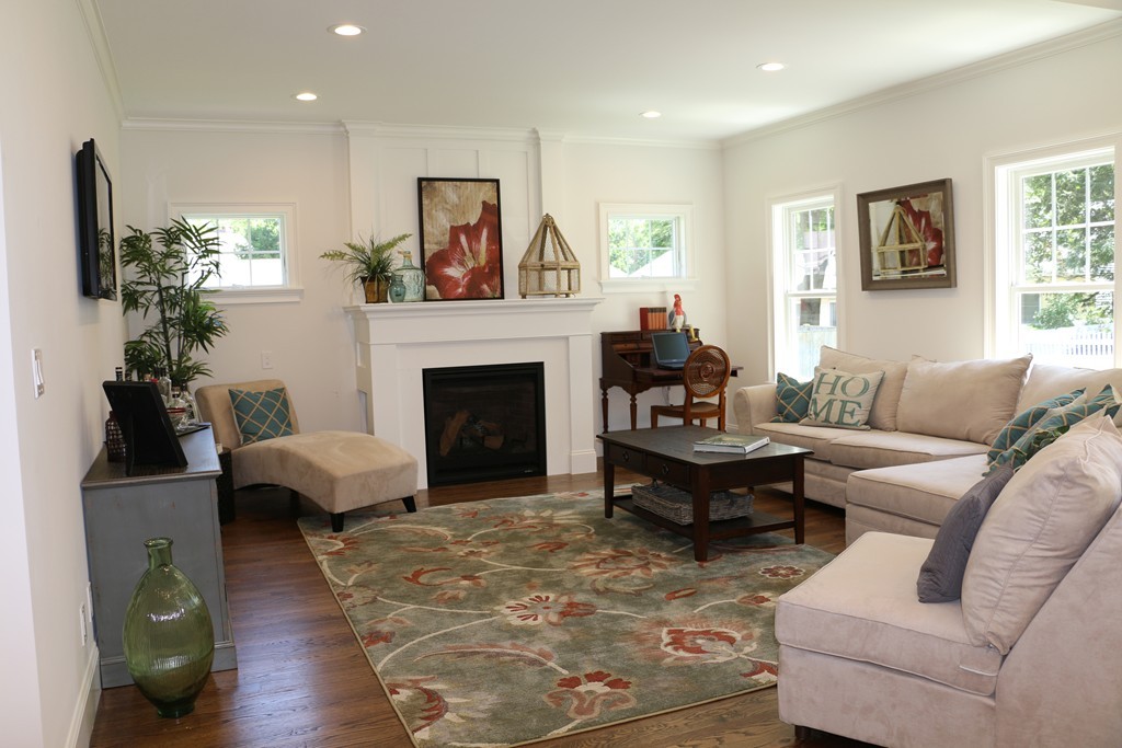 8 Patton Road Wellesley, MA 02482 - Photo 4 of 29 a living room with furniture and a fireplace