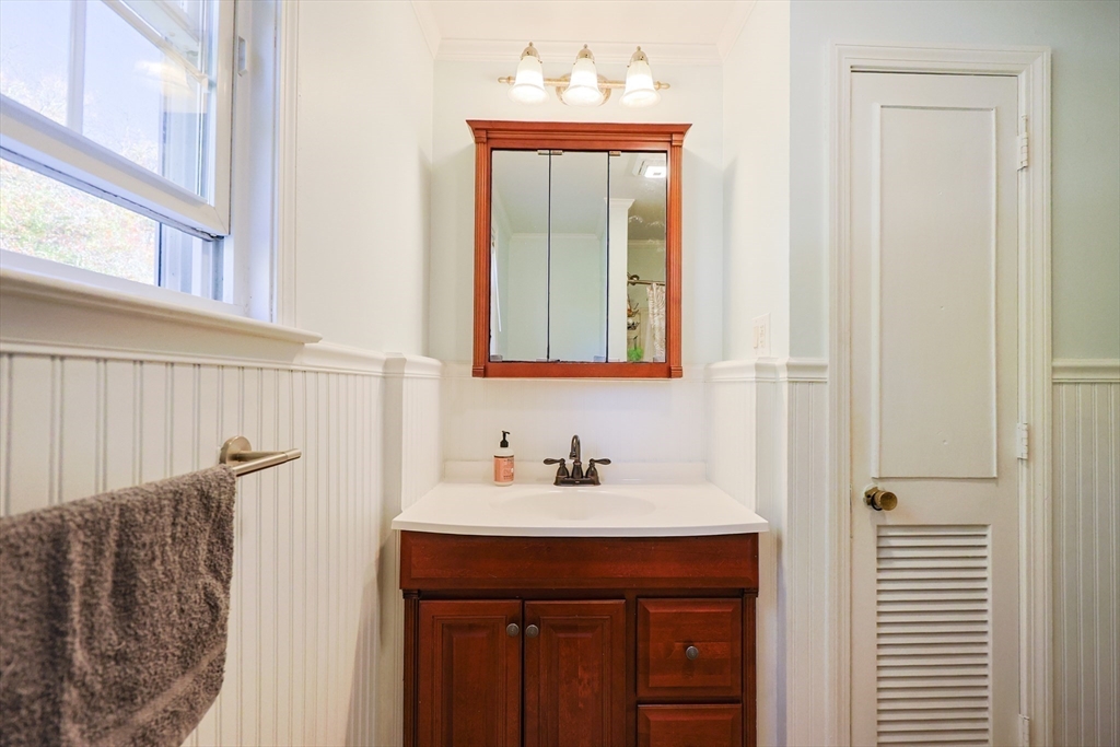 12 Randall Street Acushnet, MA 02743 - Photo 15 of 20 a bathroom with a sink and a mirror