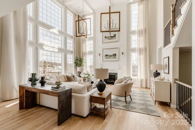 a large kitchen with a table and chairs