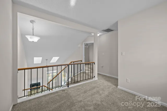 an empty room with a bathroom