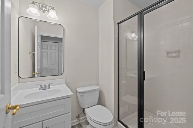 a bedroom with two beds and a couch