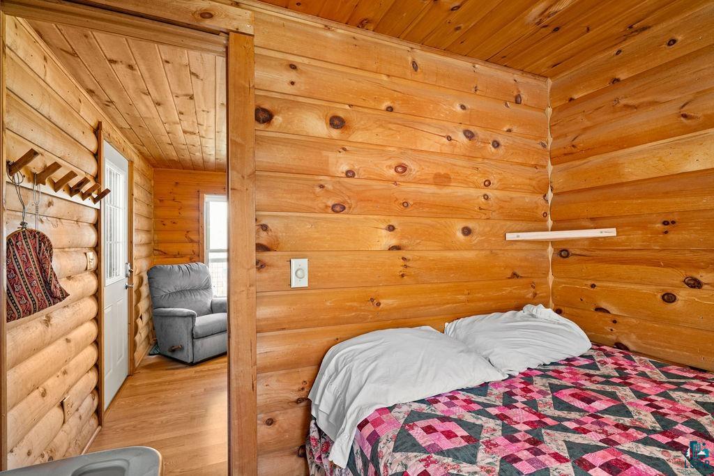 20663 Hardwood Loop Finlayson, MN 55735 - Photo 15 of 36 Wood-paneled room featuring natural wood walls and ceiling