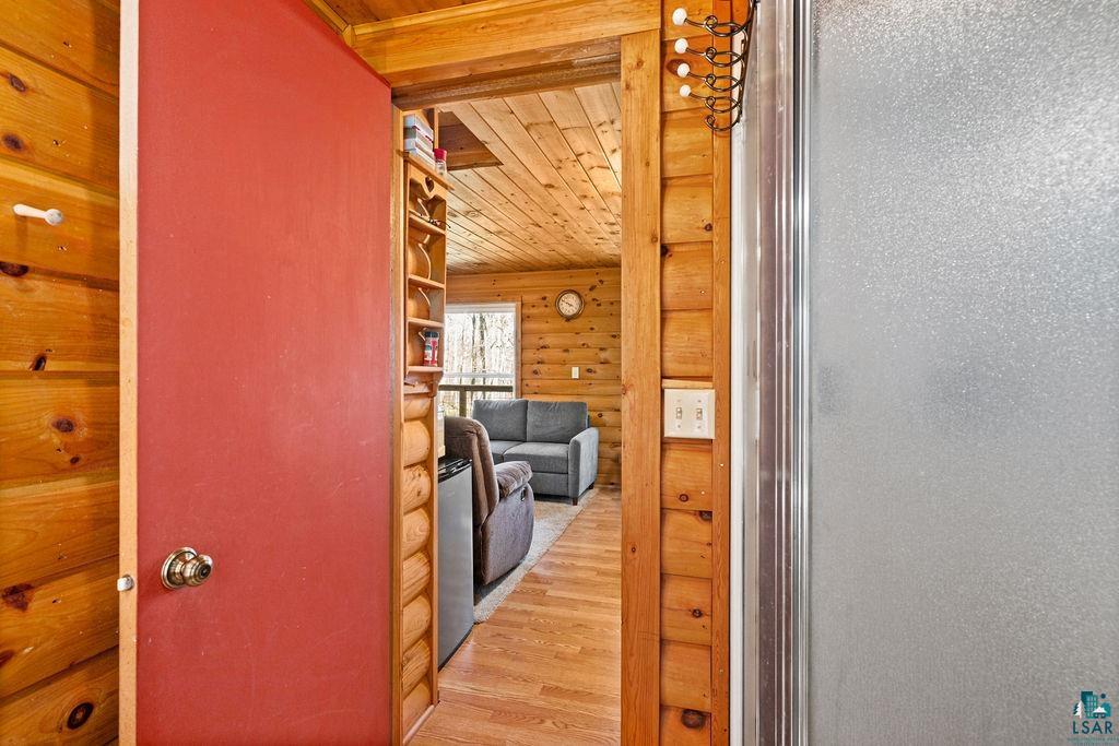 20663 Hardwood Loop Finlayson, MN 55735 - Photo 9 of 36 Wood-finish interior walls and ceiling planks