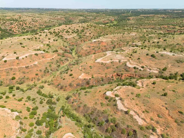 a view of a lake with mountains in the background