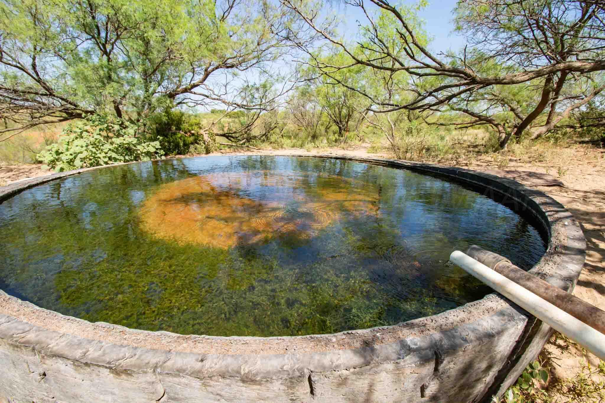 Reeves Ranch Memphis, TX 79245 - Photo 79 of 144 a view of a lake from a yard