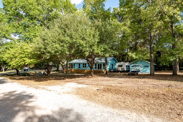 a view of a brick house with a large window