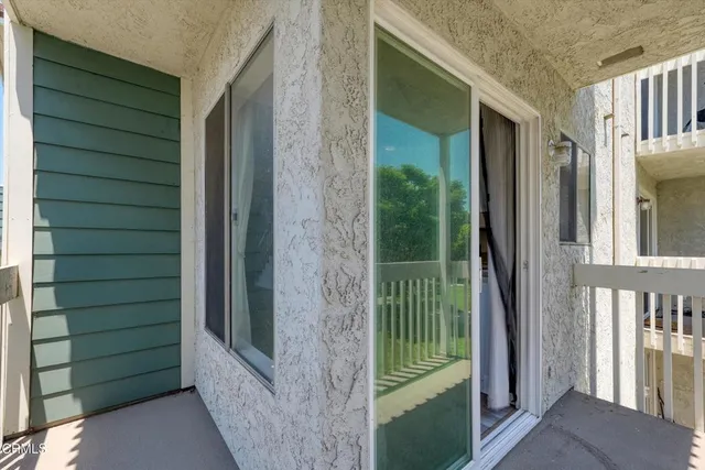 a view of a porch of a house