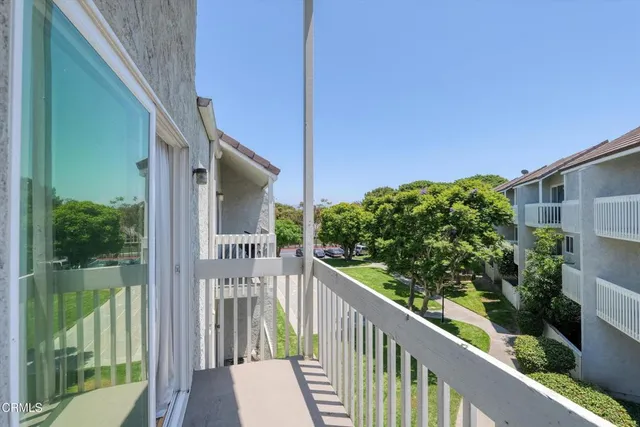 wooden floor and closet area in a room