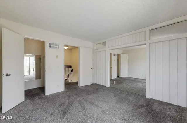 a front view of a building with street view