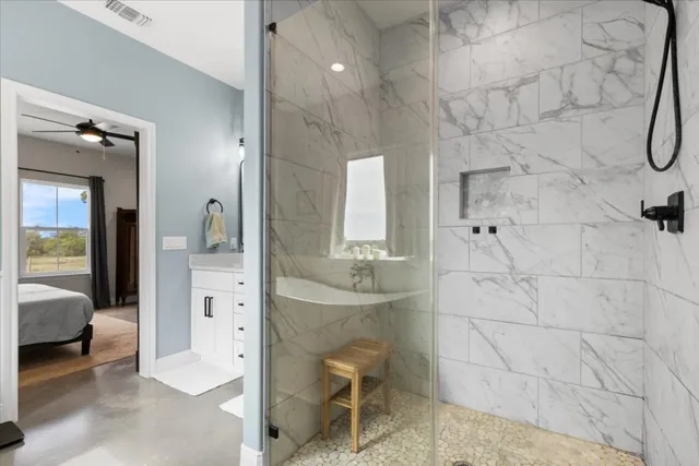 walk in closet with mirror