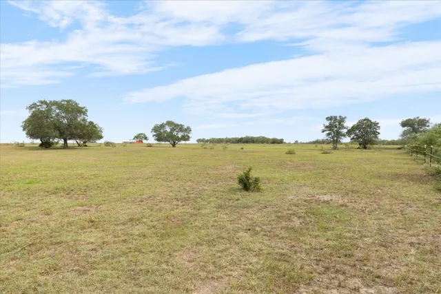 an aerial view of a houses with outdoor space