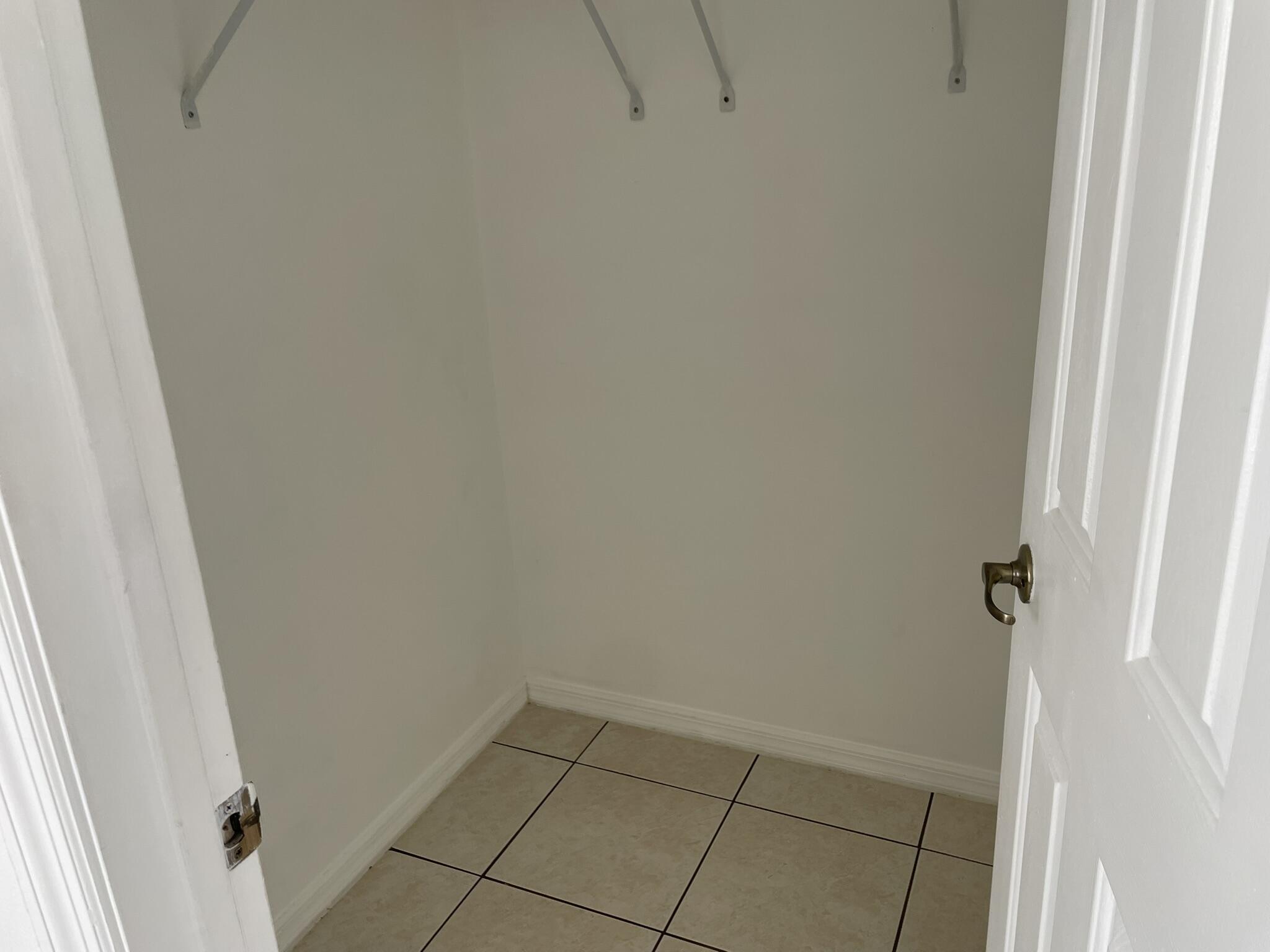 4448 Northwest Bighorn Avenue Port St. Lucie, FL 34983 - Photo 11 of 19 a view of a closet