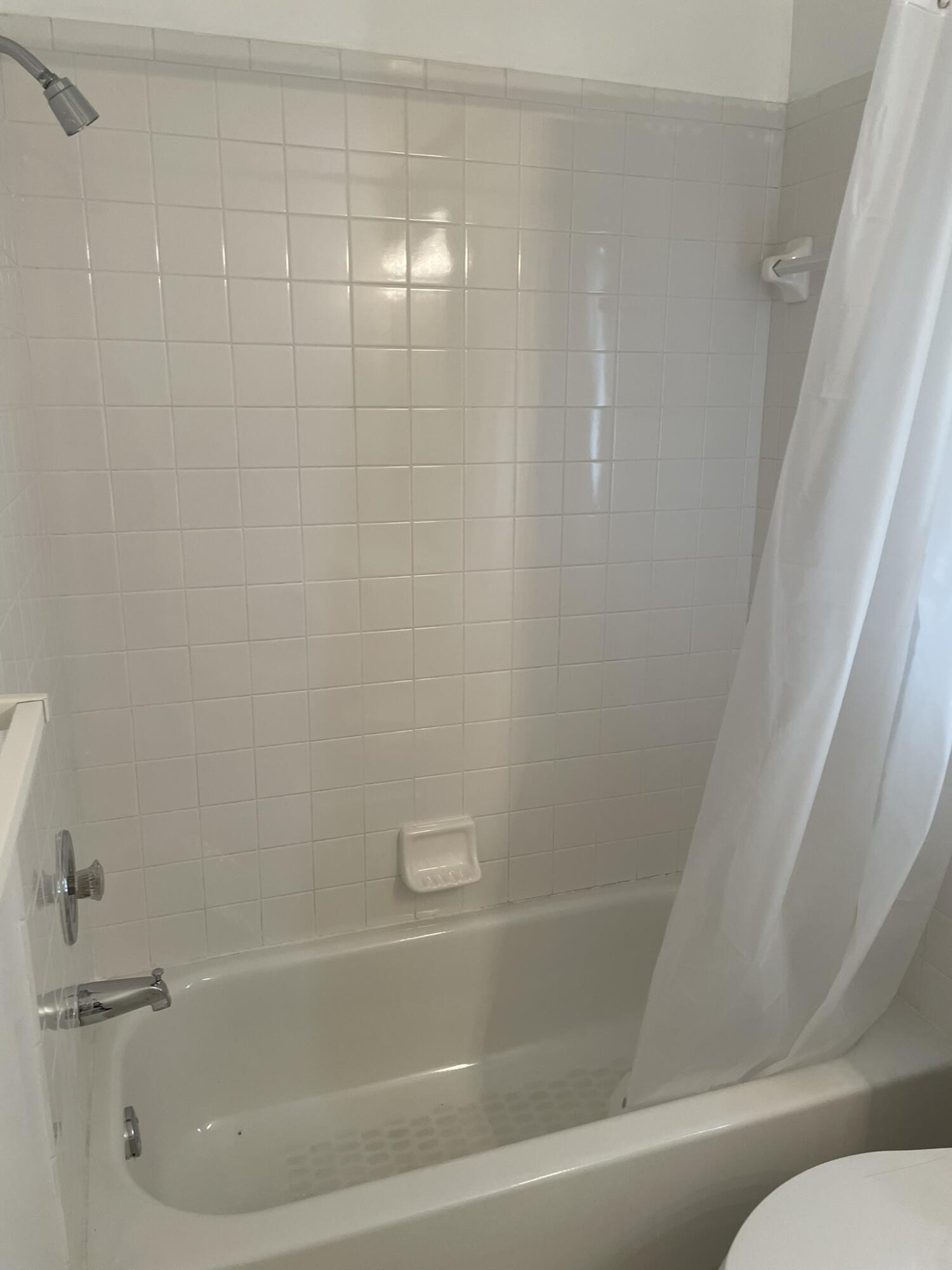 4448 Northwest Bighorn Avenue Port St. Lucie, FL 34983 - Photo 15 of 19 a bathroom with a bathtub