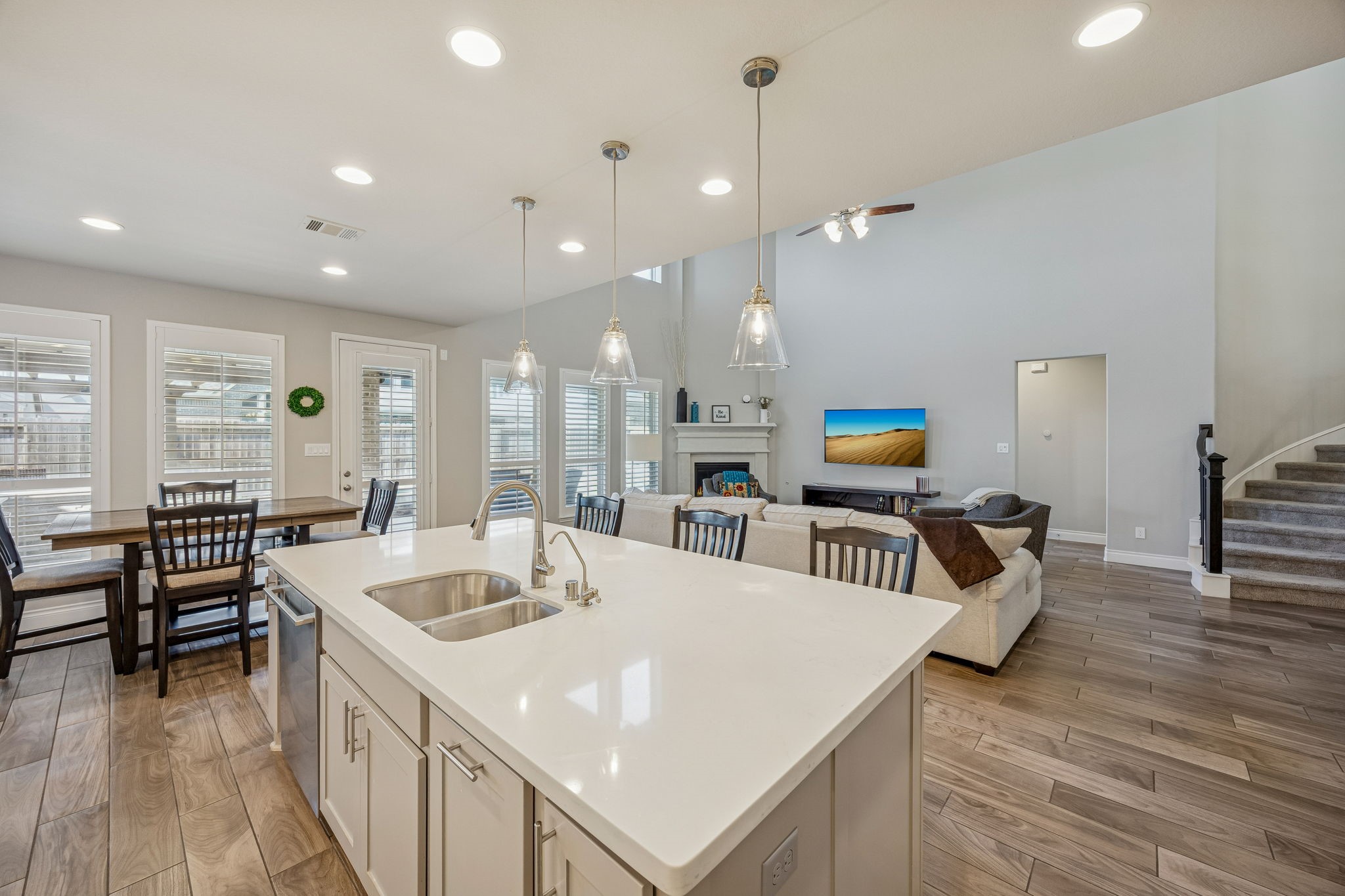 28706 Casen Ranch Lane Fulshear, TX 77441 - Photo 10 of 31 The functional layout includes a large walk-in pantry and specialized pots and pans drawers, ensuring a perfectly organized culinary workspace.