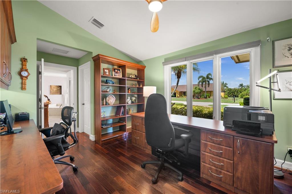 2209 Regal Way Naples, FL 34110 - Photo 21 of 24 a view of a workspace with furniture and a window