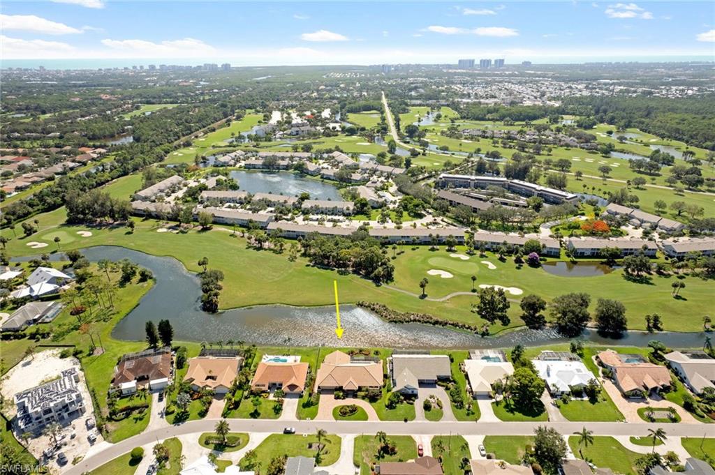 2209 Regal Way Naples, FL 34110 - Photo 24 of 24 an aerial view of residential houses with outdoor space
