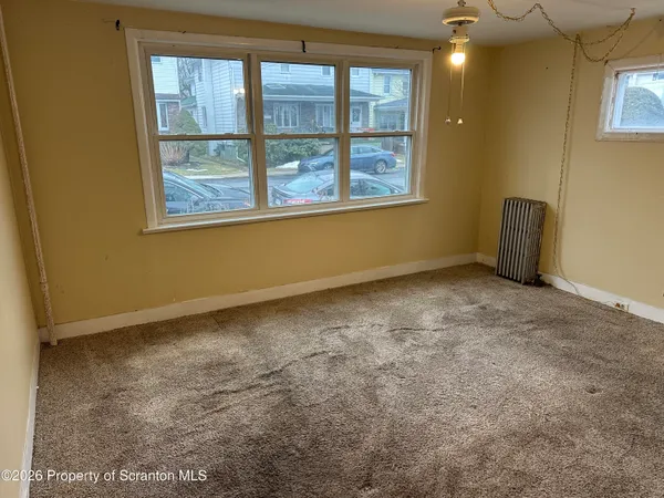 an empty room with a window