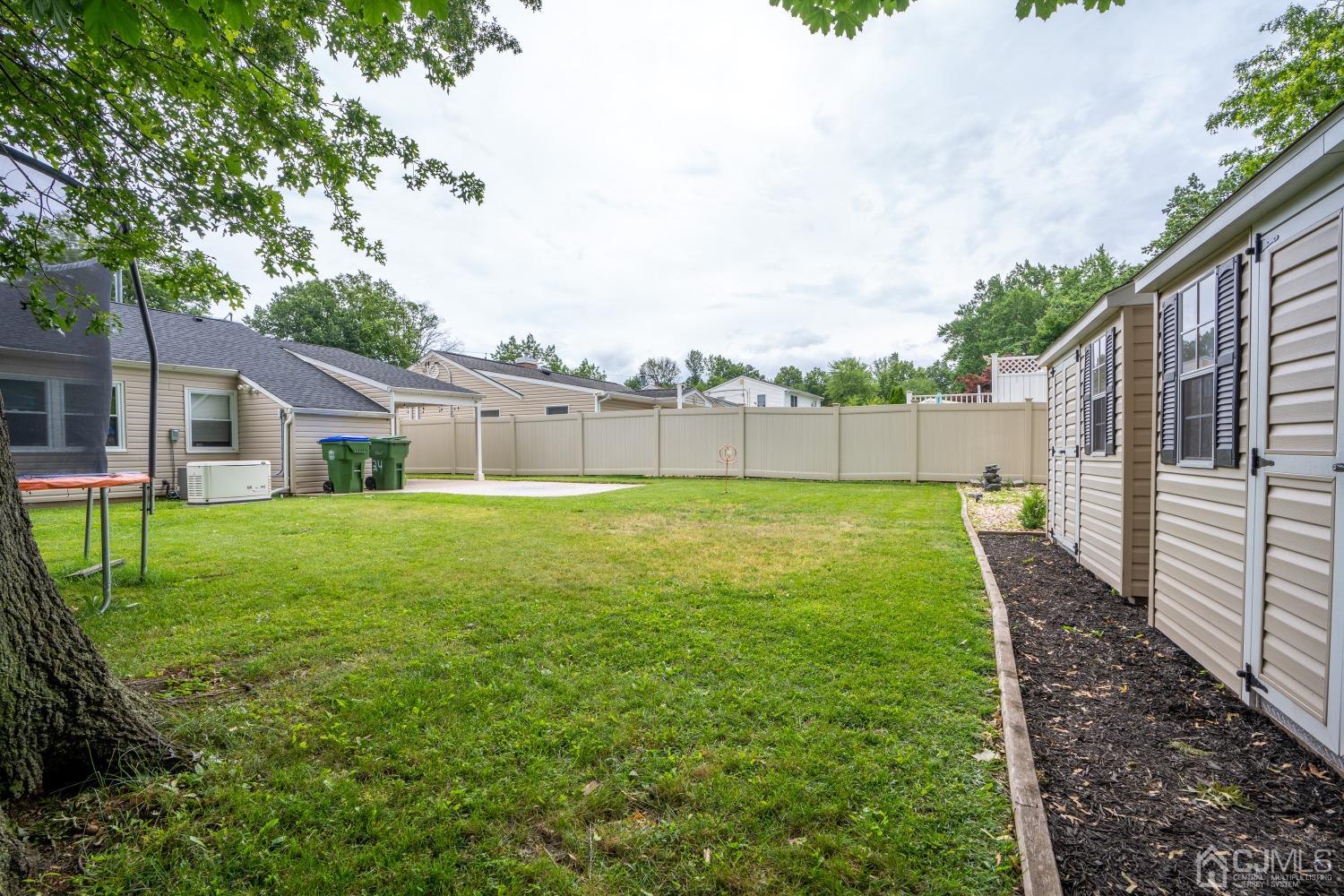 24 Kenmore Road Edison, NJ 08817 - Photo 19 of 21 a house view with a garden space