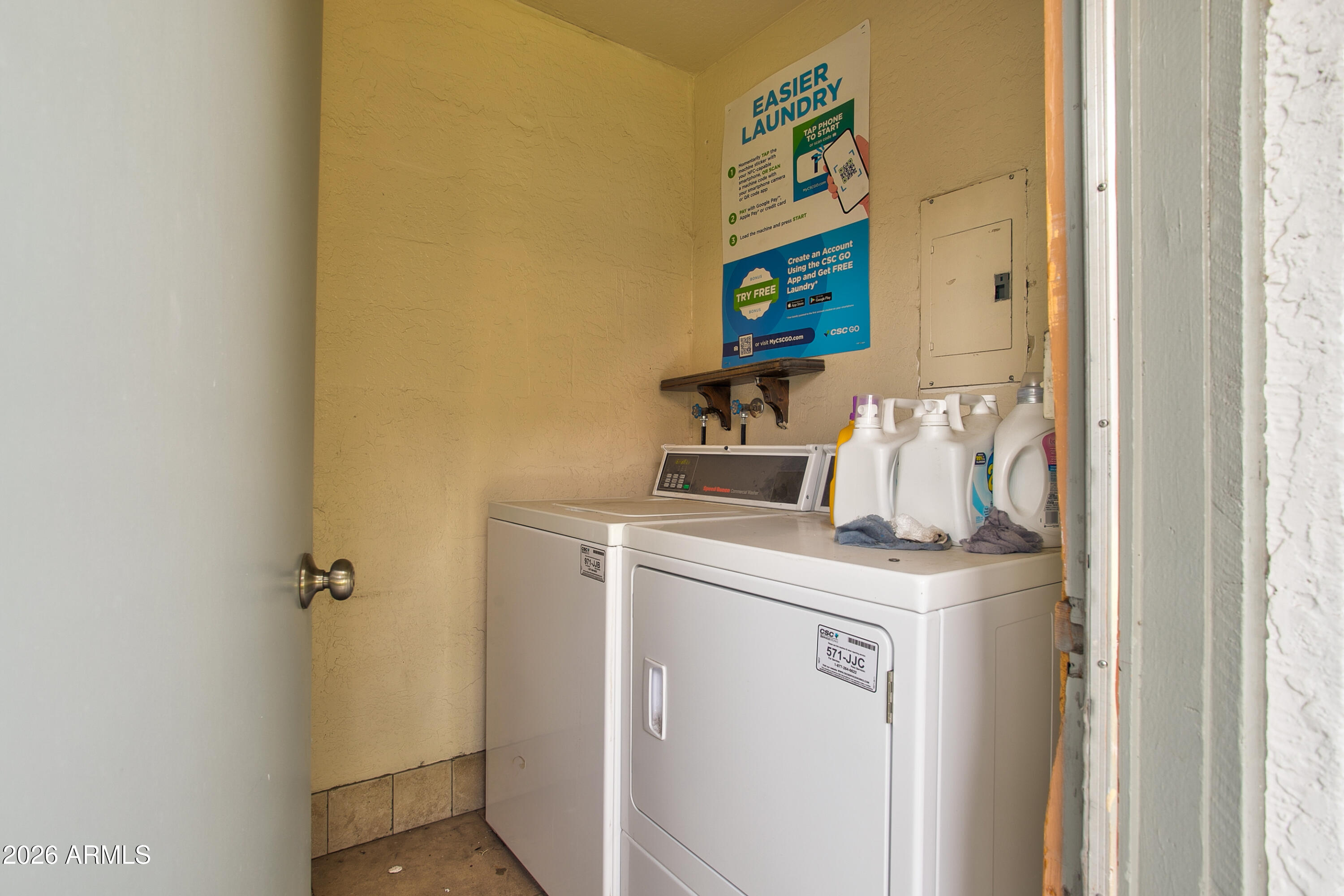 2215 West Augusta Avenue, Unit 102 Phoenix, AZ 85021 - Photo 10 of 39 a utility room with dryer and washer