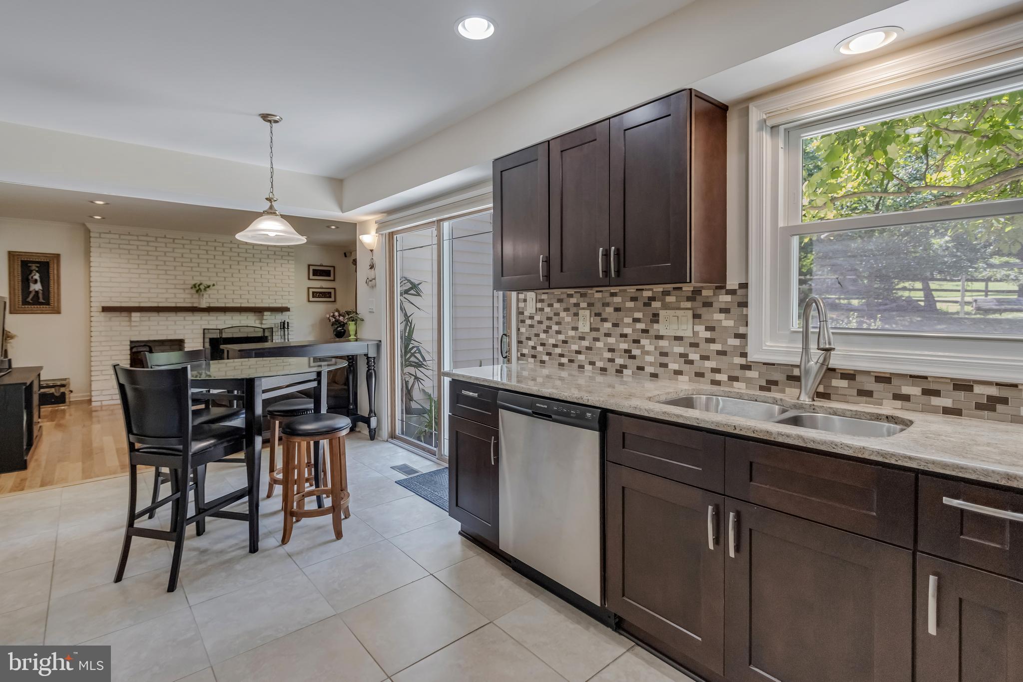 13824 Rippling Brook Drive Silver Spring, MD 20906 - Photo 11 of 39 Renovated kitchen with granite countertops