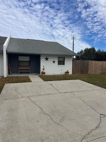 a house view with a outdoor space