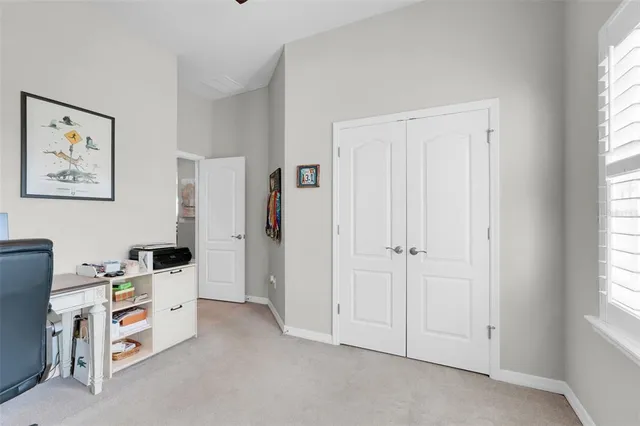 a room with furniture and a window