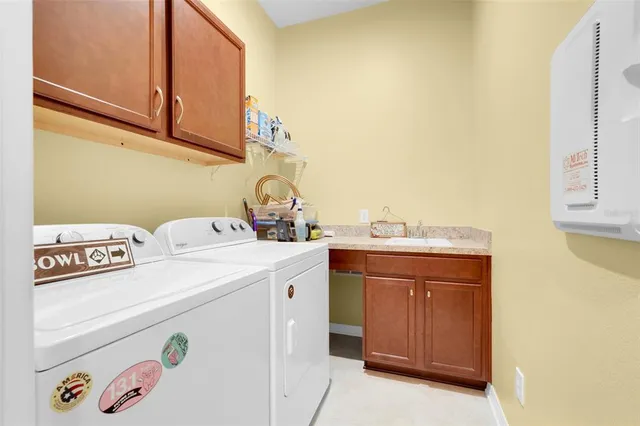 a view of a swimming pool with a lounge chairs