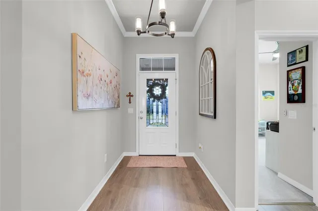 a view of livingroom with hardwood floor and hallway