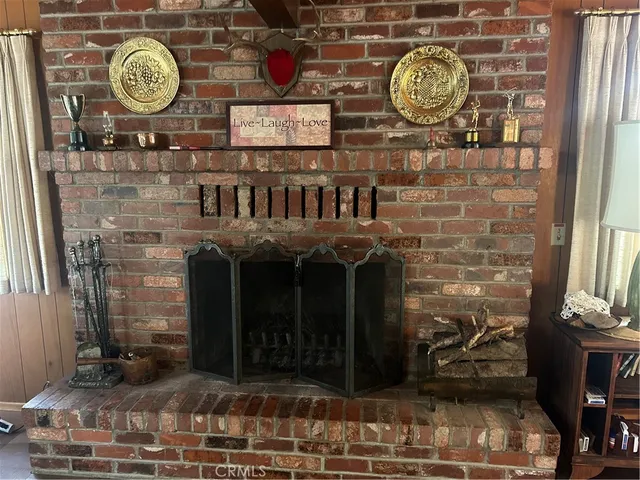 a bathroom with a granite countertop and a sink