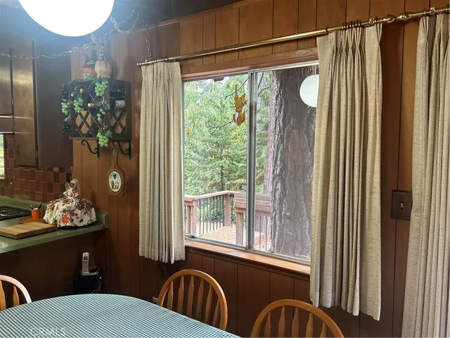 a bathroom with a toilet a sink and a mirror
