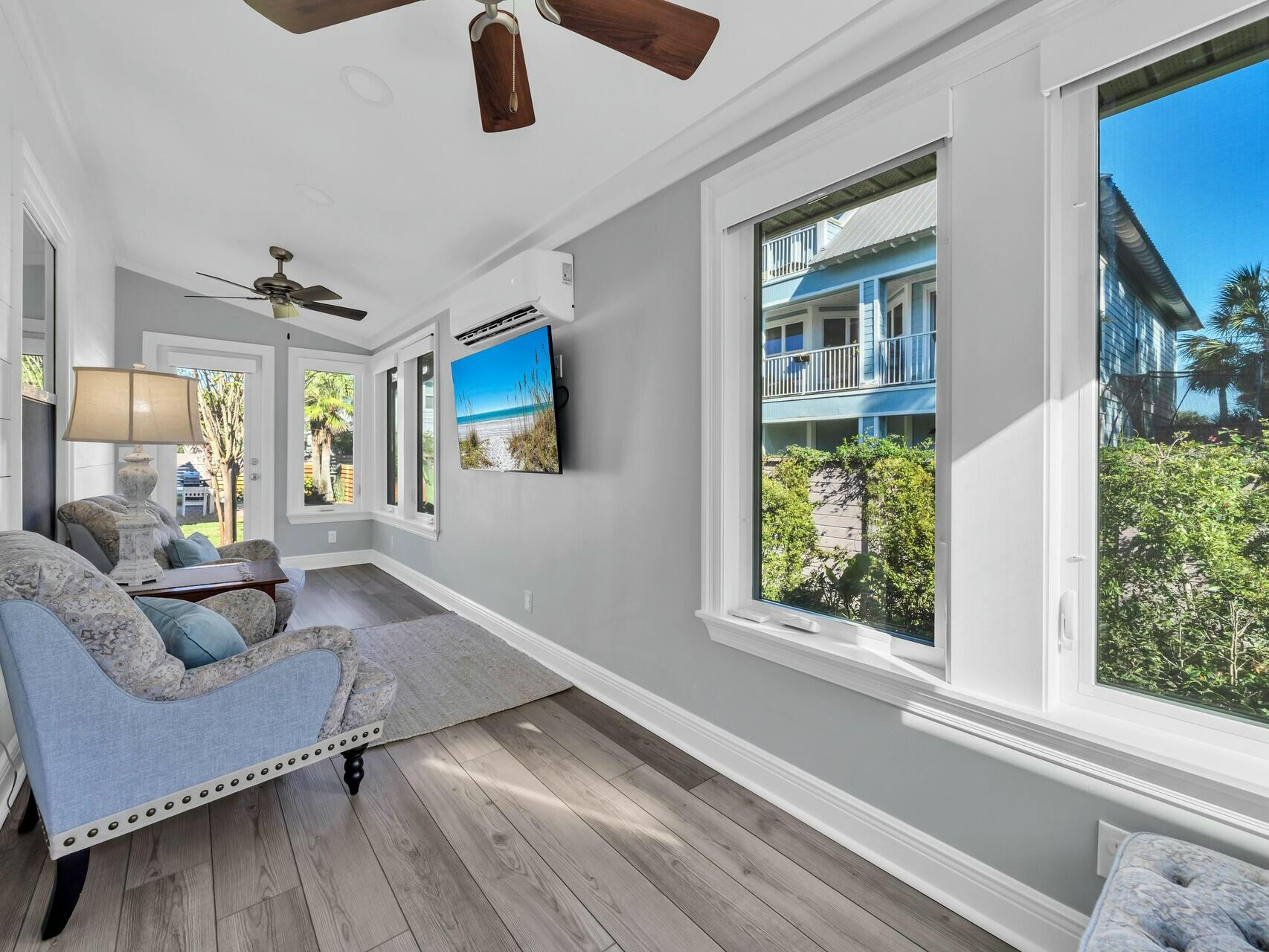 188 Ocean Spray Circle Santa Rosa Beach, FL 32459 - Photo 47 of 75 a living room with furniture and a large window