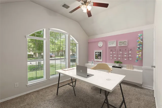 a view of a livingroom with furniture and window