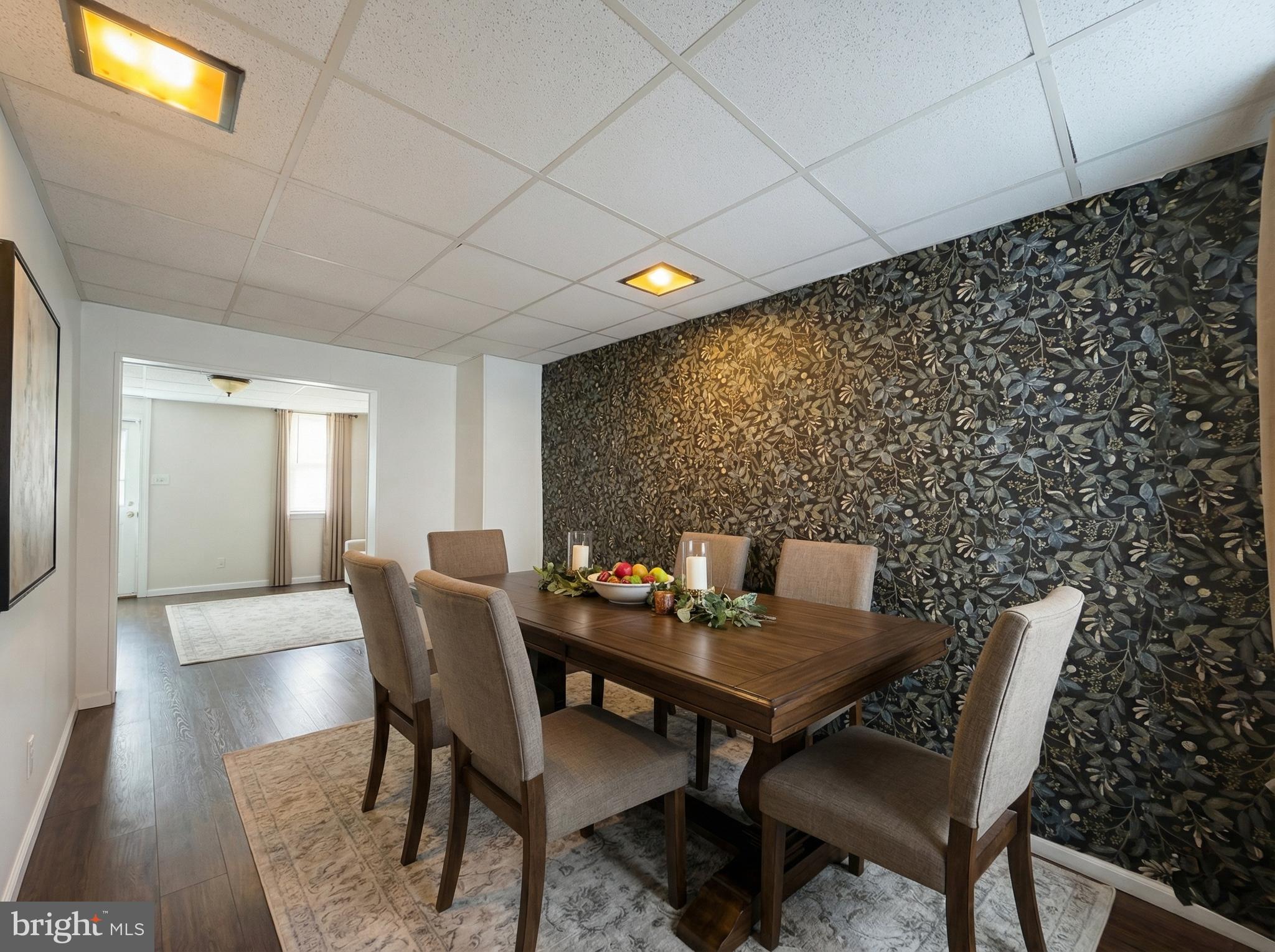 151 Arch Street York, PA 17401 - Photo 4 of 15 a view of a dining room with furniture and wooden floor