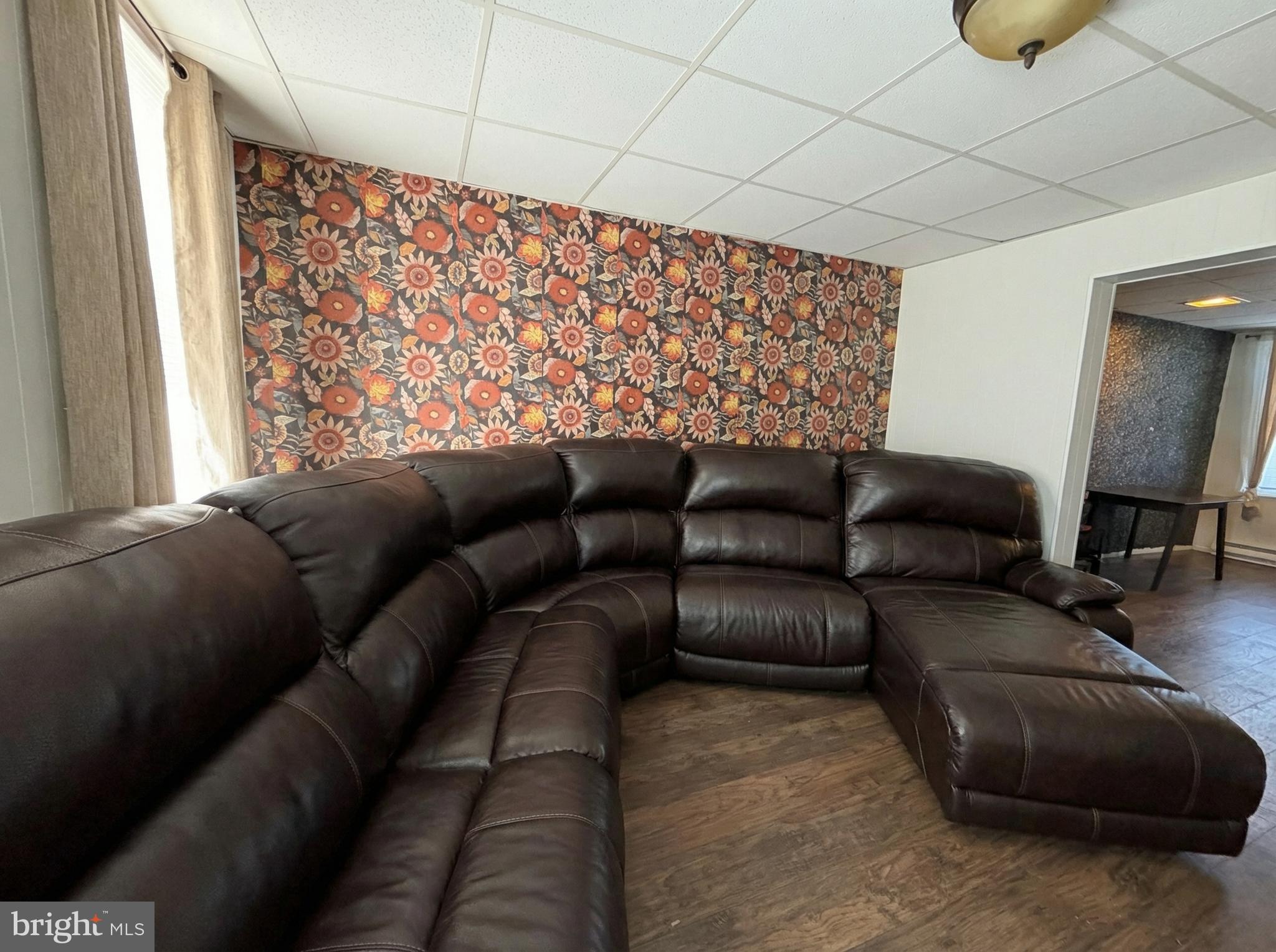 151 Arch Street York, PA 17401 - Photo 7 of 15 a living room with furniture and a couch