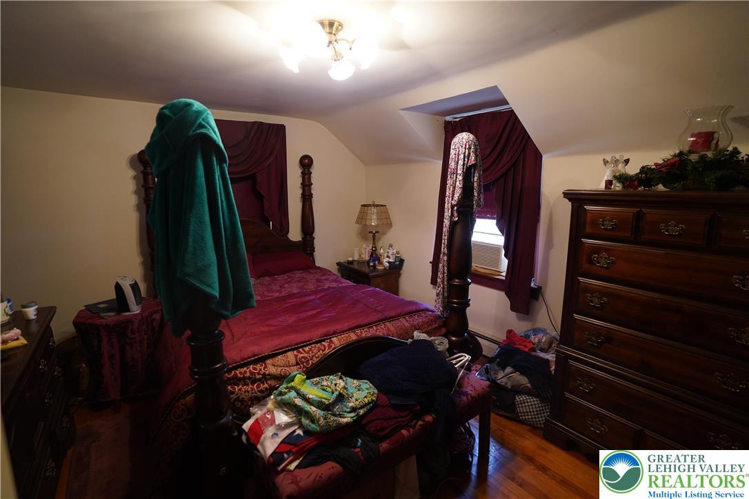 3065 Quarry Street Coplay, PA 18037 - Photo 13 of 19 a living room with furniture and a mirror