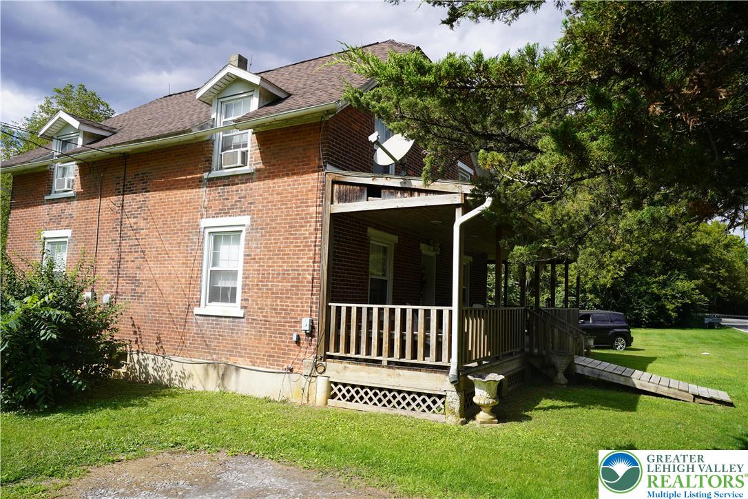 3065 Quarry Street Coplay, PA 18037 - Photo 2 of 19 a view of a house with a yard