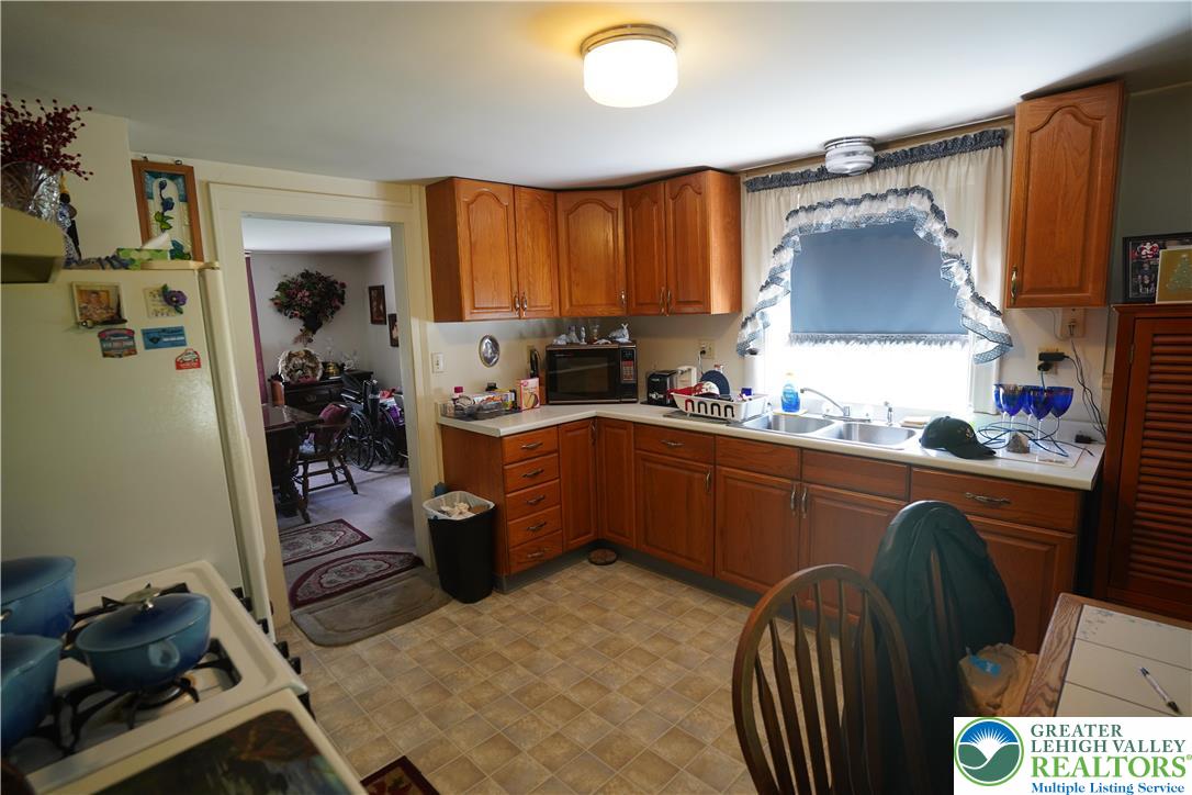3065 Quarry Street Coplay, PA 18037 - Photo 9 of 19 a kitchen with a sink appliances and cabinets
