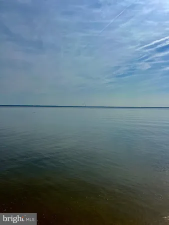 a view of a lake with a beach