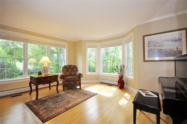 71 Chamberlain Road Westford, MA 01886 - Photo 11 of 30 a living room with furniture and a large window