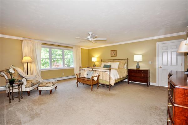 71 Chamberlain Road Westford, MA 01886 - Photo 17 of 30 a bedroom with furniture and a window