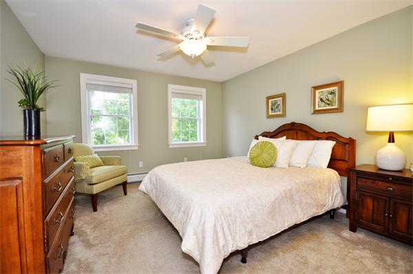 71 Chamberlain Road Westford, MA 01886 - Photo 20 of 30 a bedroom with a bed and window
