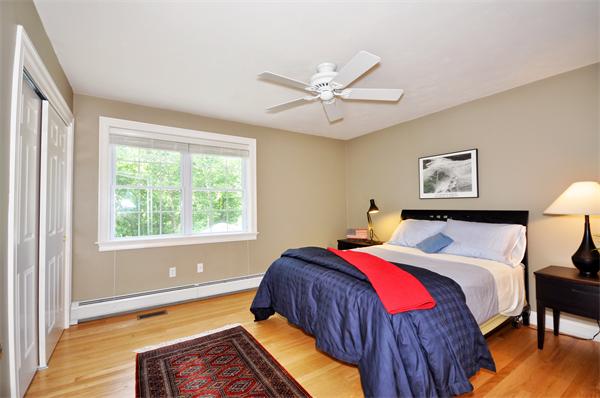 71 Chamberlain Road Westford, MA 01886 - Photo 21 of 30 a bed room with a bed and a window
