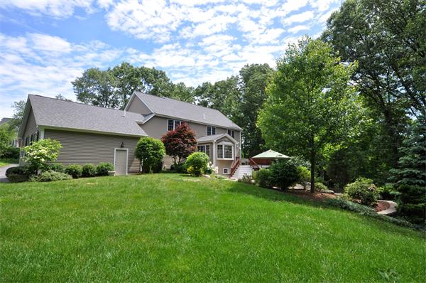 71 Chamberlain Road Westford, MA 01886 - Photo 26 of 30 a house view with a garden space