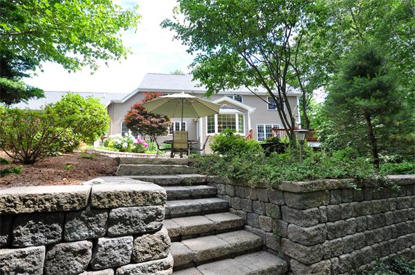 71 Chamberlain Road Westford, MA 01886 - Photo 30 of 30 a view of a house with a yard and large trees