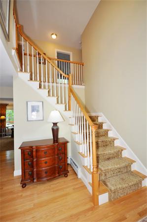 71 Chamberlain Road Westford, MA 01886 - Photo 3 of 30 a view of entryway and hall with wooden floor